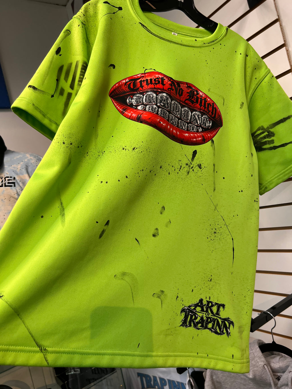 TRAPINN ORIGINALS — Neon Green Graffiti Tee.
